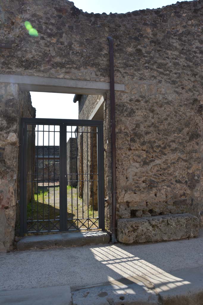 I.10.7 Pompeii. April 2017. Entrance doorway. Photo courtesy Adrian Hielscher.
According to NdS 
Of all the large and small houses, of this insula, with the exception of the Casa del Menandro, this dwelling although modest, was the one that provided the most finds. A great deal of material was found in every room of the house, in which the number of objects, having a character of practical usefulness and intrinsic value, was remarkable.
See Notizie degli Scavi, 1934,  (p.292)
For details of finds and their locations, 
See Notizie degli Scavi, 1934,  (p.292-308)
For details of finds from this house,
See Allison, P.M. (2006). The Insula of the Menander at Pompeii: Vol. III The finds, Clarendon Press, Oxford, (p.158-213, & p.337-349, & Suppl. p.275-283).
See Online Companion with details and photographs of finds from I.10.7.
