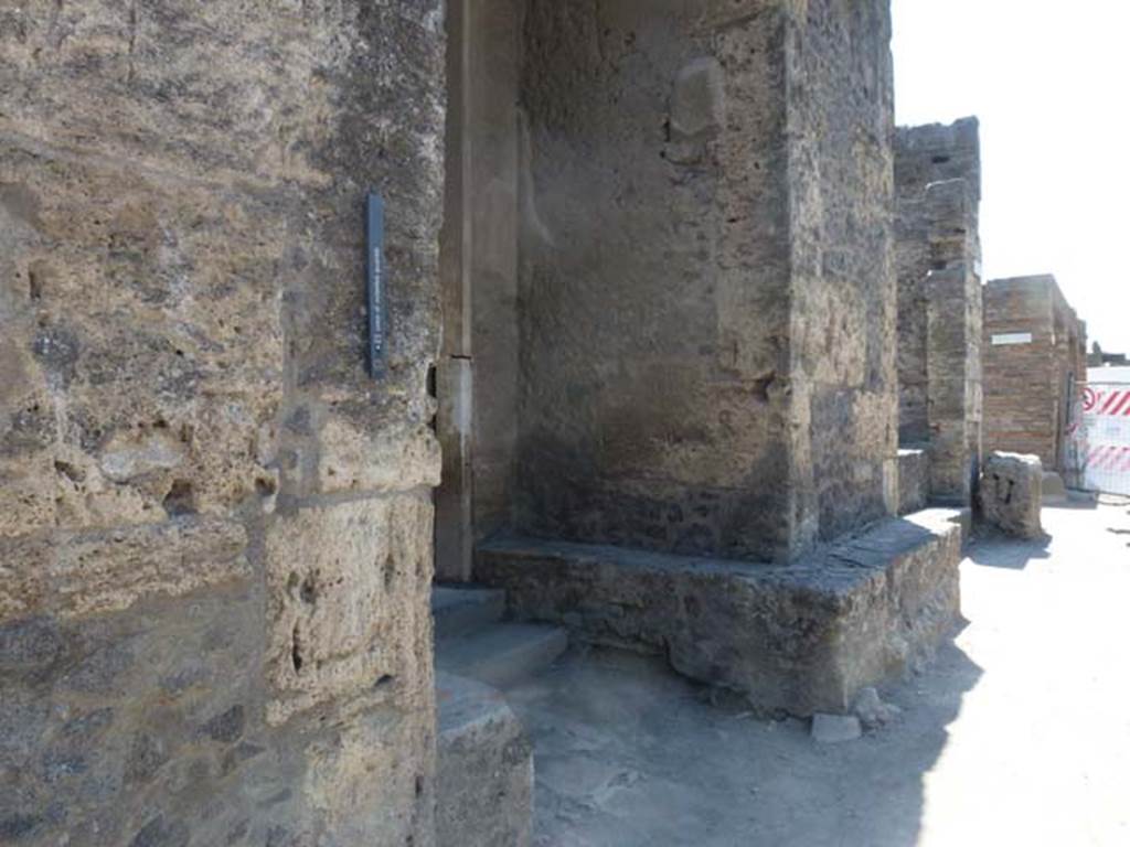 II.2.2 Pompeii. June 2012. Entrance doorway on Via dell Abbondanza, looking west. Photo courtesy of Michael Binns.
