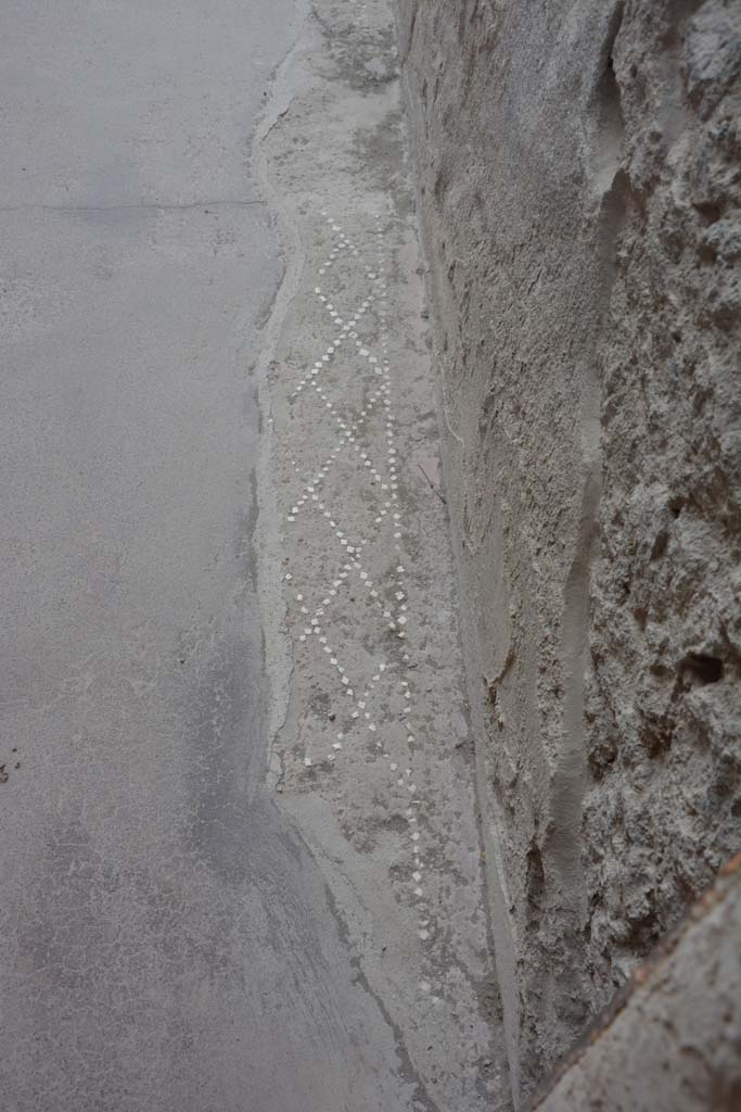 II.2.2 Pompeii. July 2017. Entrance corridor/fauces 1, detail of remaining pattern on west side.
Foto Annette Haug, ERC Grant 681269 DCOR.

