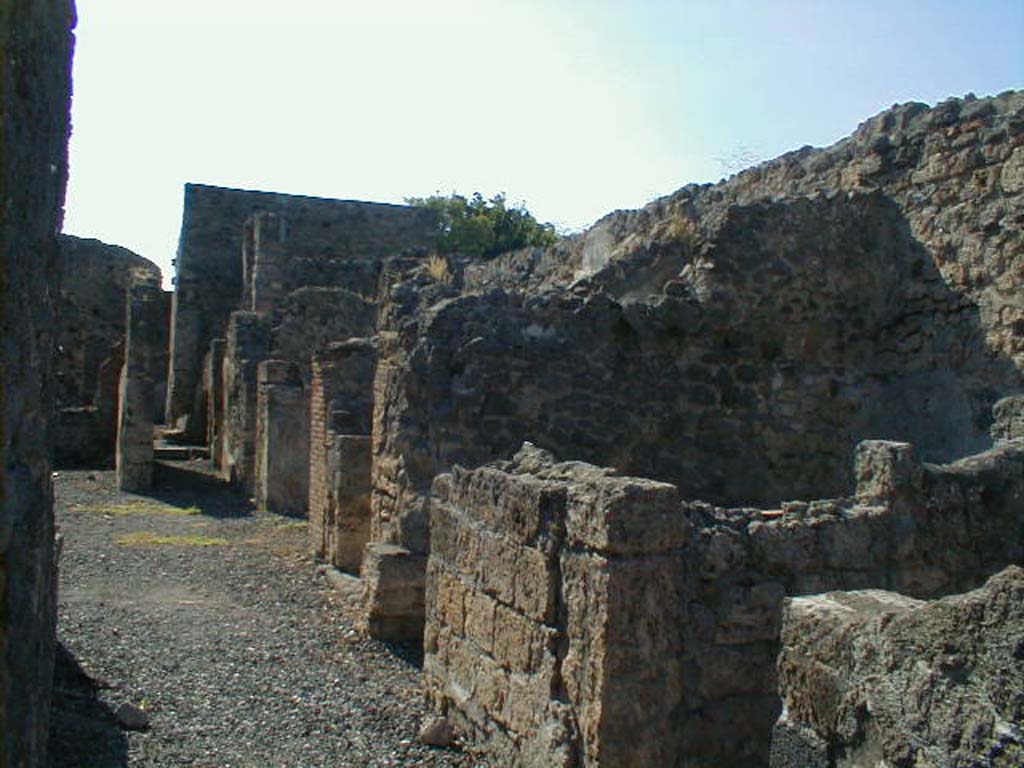 VI.7.16 Pompeii. September 2004. Rooms on the north side of the atrium.
