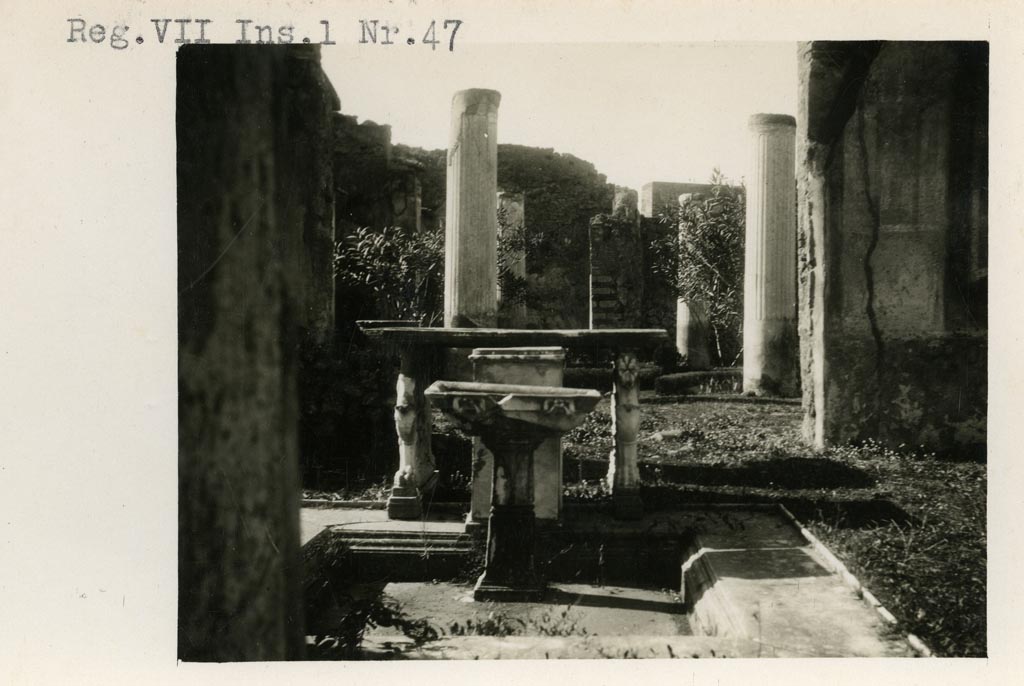 VI.1.25 Pompeii, but shown as VII.1.47 on photo. Pre-1937-39. Atrium 24, looking west from impluvium through doorway to peristyle 31. 
Photo courtesy of American Academy in Rome, Photographic Archive. Warsher collection no. 1509.
