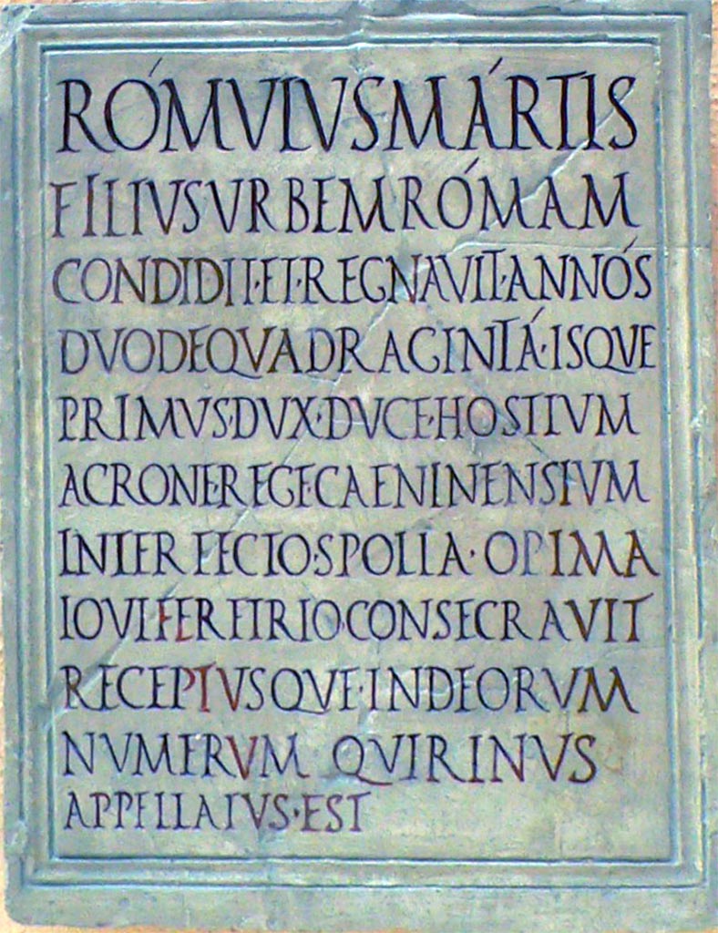 VII.9.1 Pompeii. Reconstruction of original Romulus eulogy plaque found in 1817. The letters in red are reconstructed.
Now in Museo della Civiltà Romana, Rome.
Kockel describes the plaque as 
Very fine light grey marble. H 69 ; B 50, 7; D (of the plaster bed) 5.5 cm. Surrounded by a simply profiled edge. Inscription field: 59.6 x 42.7 cm.
See Kockel V., 1985. Altes und Neues vom Forum und vom Gebäude der Eumachia in Pompeji, in R. Neudecker - P. Zanker (Hrsg.), Lebenswelten. Bilder und Räume in der römischen Stadt der Kaiserzeit. (= Palilia 16) Wiesbaden 2005, p. 70, Note 78.

