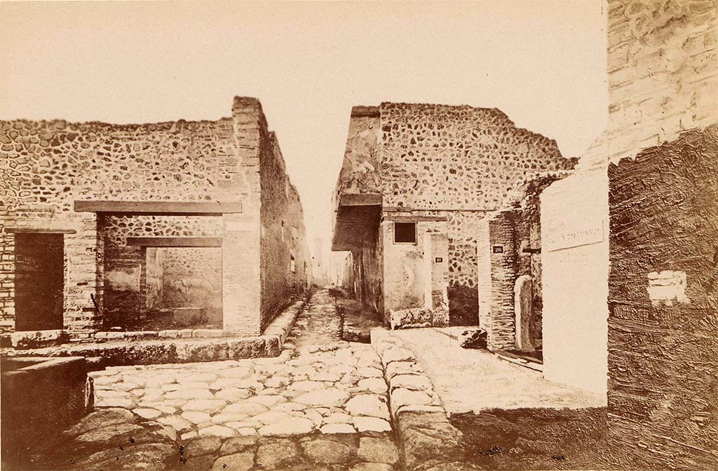 VII.12.28 Pompeii. Looking west c.1890, along Vicolo del Balcone Pensile with house on right.