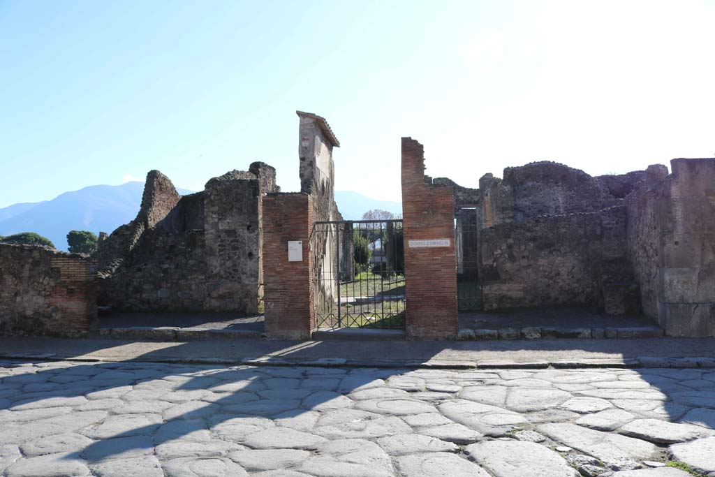 VIII.4.15 Pompeii. December 2018. 
Looking south on Via dellAbbondanza towards entrance doorway, in centre. Photo courtesy of Aude Durand.

