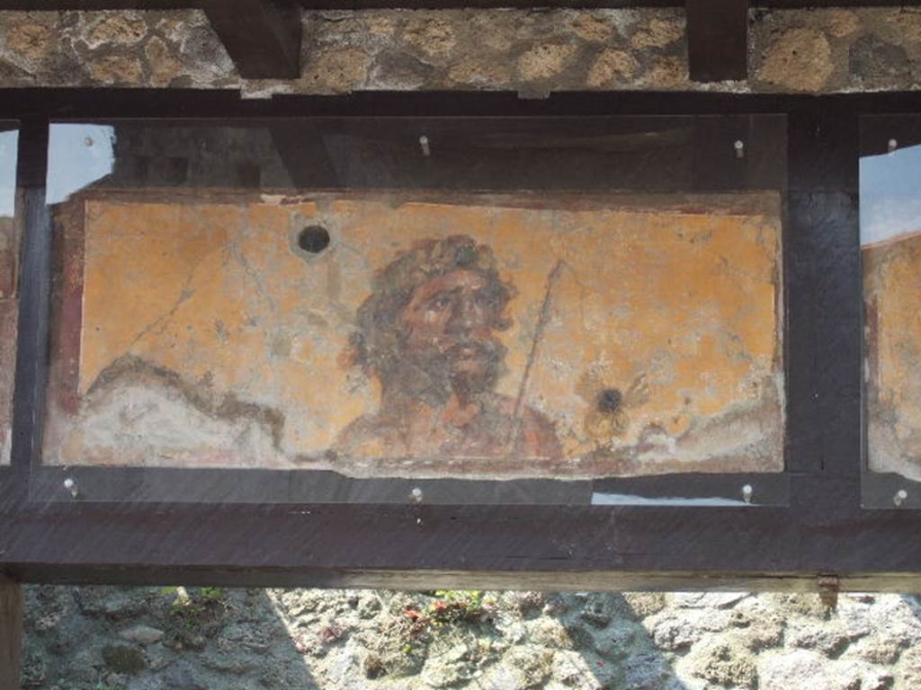 IX.7.1 Pompeii. September 2019. Painting of Apollo or Sol with the cosmic crown and a whip.  
Photo courtesy of Klaus Heese. 
