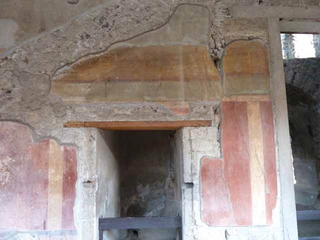 Villa of Mysteries, Pompeii. May 2010. Peristyle C. Painted wall above doorway to unnumbered room.