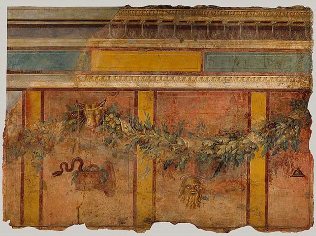 Villa of P Fannius Synistor at Boscoreale. Room L exedra/tablinum, west wall. 
Garland with Silenus mask, sacred basket, and bucrania (ceremonial bulls heads).
These are all references to the god Dionysus.
According to Barnabei, above a dark zoccolo (plinth), a metre tall, finished at the top with a white strip, large red cinnabar panels ran up the wall. 
The panels were one metre and twenty centimetres tall, and eighty centimetres wide. 
These red panels were separated by yellow stripes, about fifteen centimetres wide. 
The red panels were surrounded by a narrow band of brown. 
See Barnabei F., 1901. La villa pompeiana di P. Fannio Sinistore. Roma: Accademia dei Lincei. p. 39-46.
Photo  The Metropolitan Museum of Art, Rogers Fund 1903. Inventory number 03.14.4.
See www.metmuseum.org

