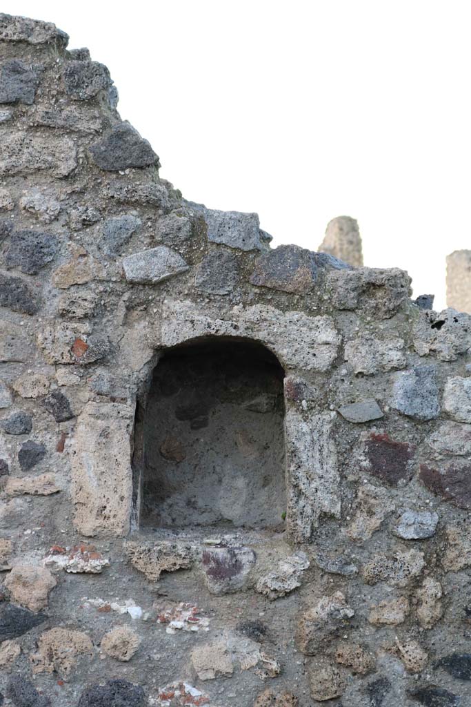 VII.16.7, Pompeii. December 2018. 
Looking towards niche on west wall at north end. Photo courtesy of Aude Durand.
