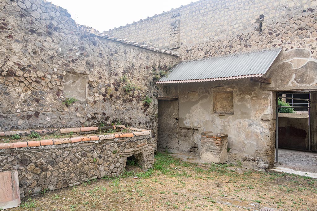 Villa of Mysteries, Pompeii. July 2024. Looking towards west wall with rectangular niche. Photo courtesy of Johannes Eber.