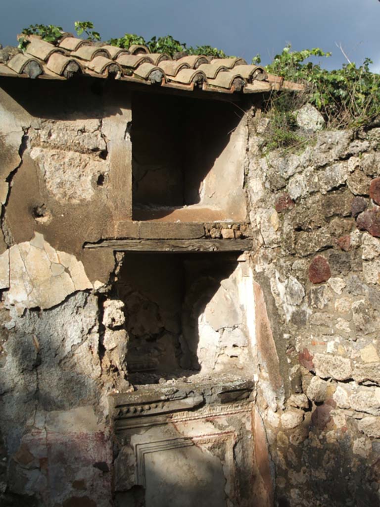 VII.3.13 Pompeii. December 2004. Double lararium on east side of garden area.