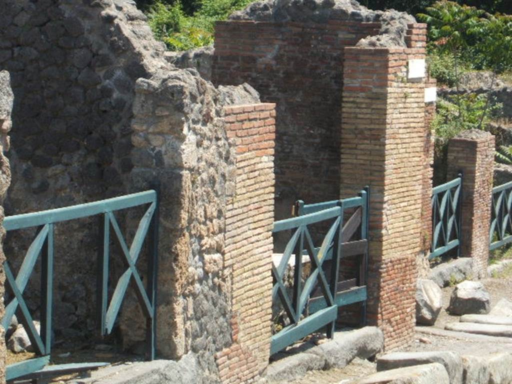 I.2.2 and  I.2.1 Pompeii. September 2005. Looking south along east side of Via Stabiana.