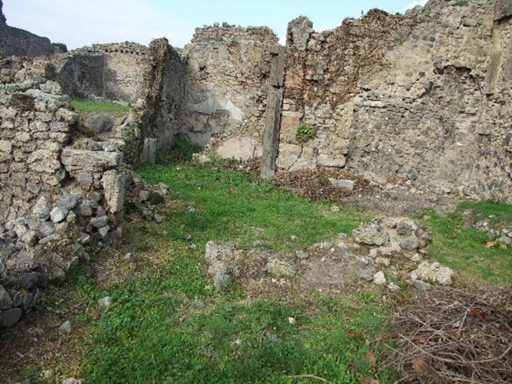 I.2.3 Pompeii. December 2006. Looking north from storeroom on south side, across garden area.