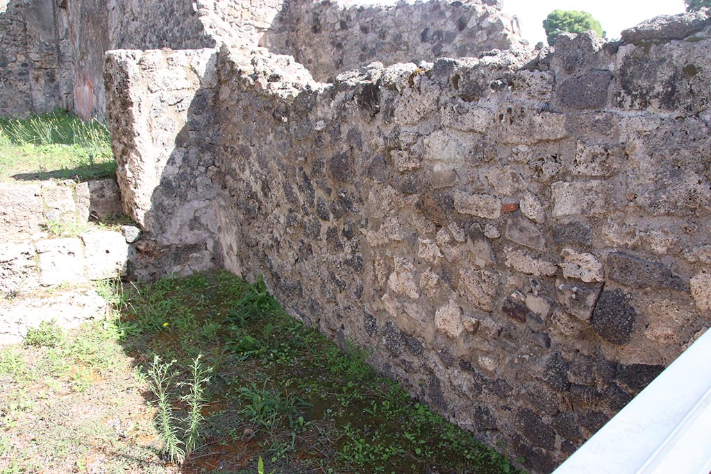 I.2.9 Pompeii. October 2024. Looking east along south wall of shop. Photo courtesy of Klaus Heese.