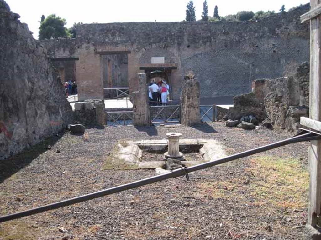 I.2.10 Pompeii. September 2010. Looking west from tablinum, across atrium to doorway and Via Stabiana. Photo courtesy of Drew Baker.
