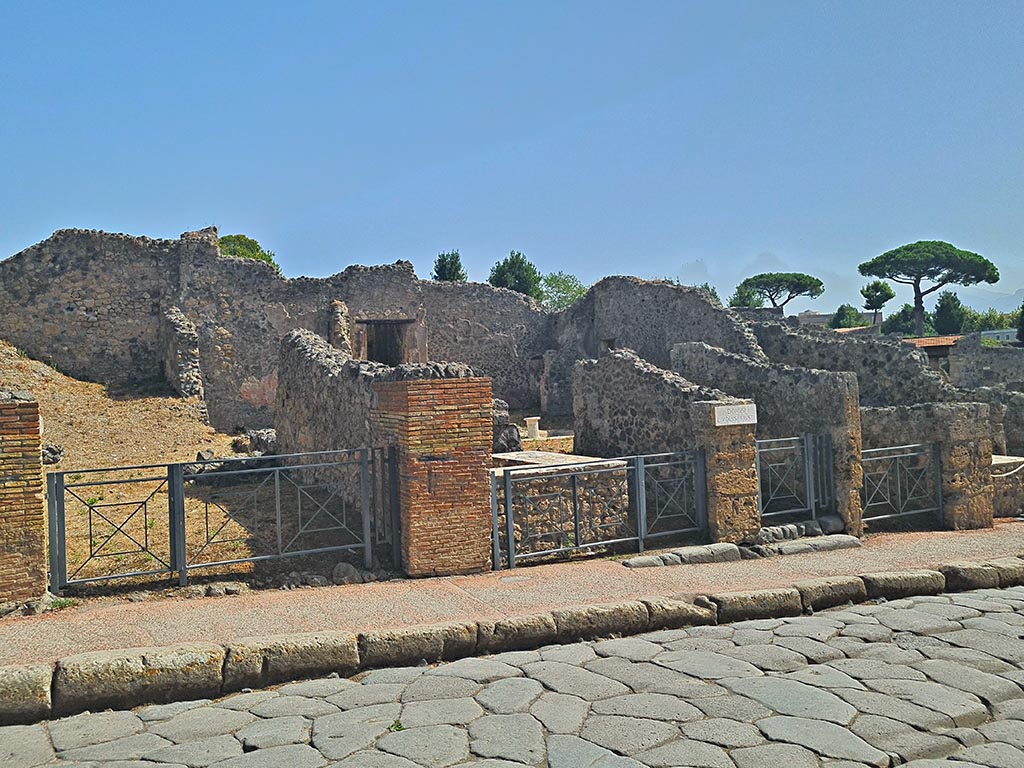 I.2.12 Pompeii, on right. September 2024. 
East side of Via Stabiana, with entrance doorways from I.2.12, I.2.11, I.2.10 and I.2.9. Photo courtesy of Giuseppe Ciaramella.
