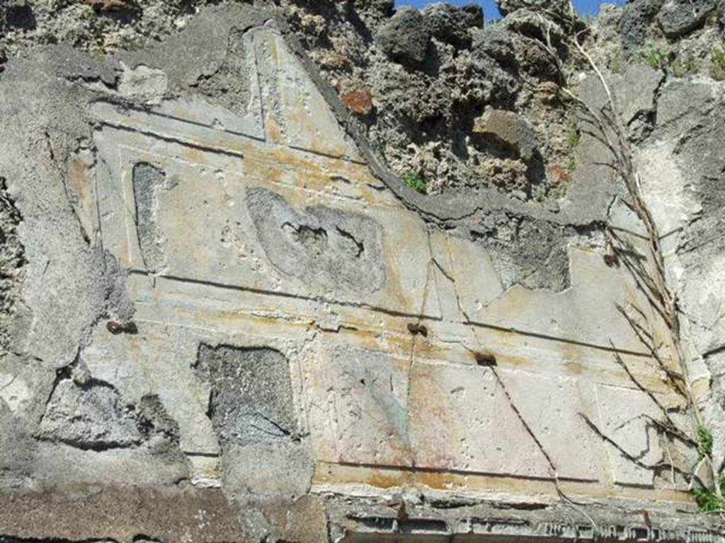 I.2.16 Pompeii. March 2009. Room 4, north wall of oecus with detail of remains of first style decoration.