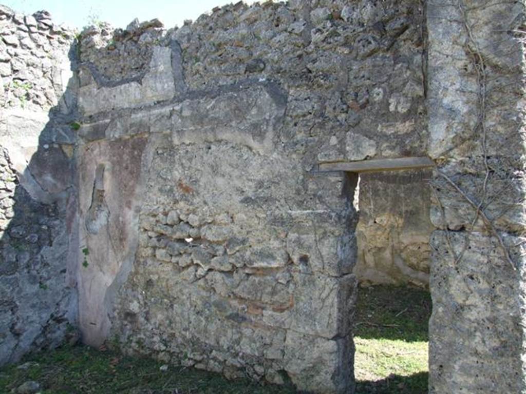 I.2.16 Pompeii. March 2009. Room 4, oecus. South wall with doorway to room 5.