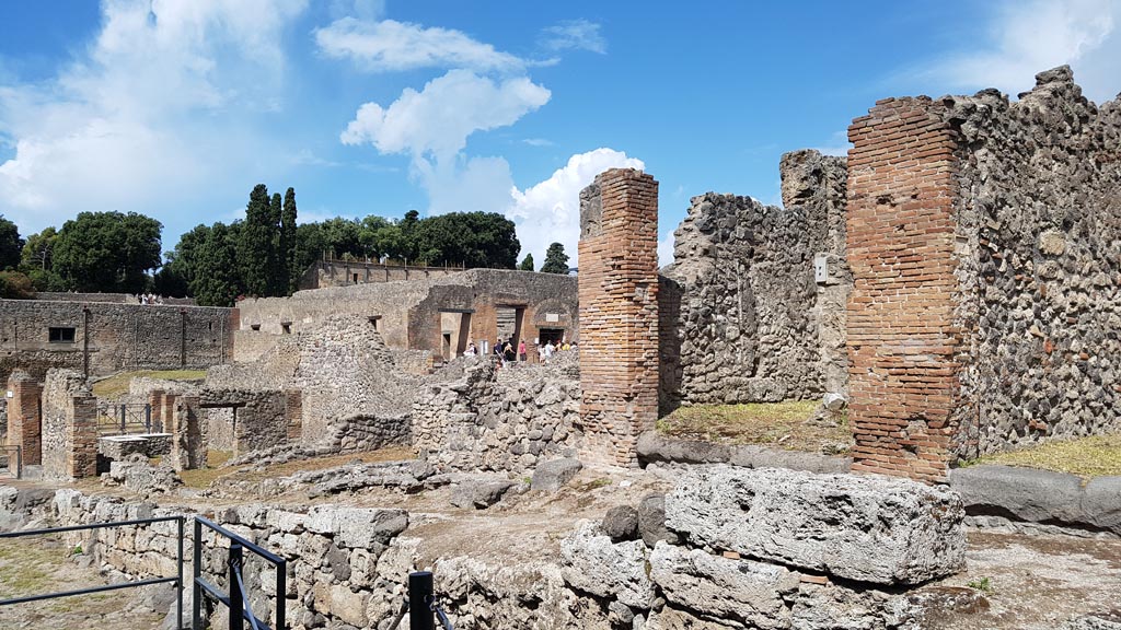 I.2.29 Pompeii. August 2023. 
Looking north-west on Vicolo delle Conciapelle towards entrance doorway to I.2.29, centre right, with I.2.28 on right. 
Photo courtesy of Maribel Velasco.
