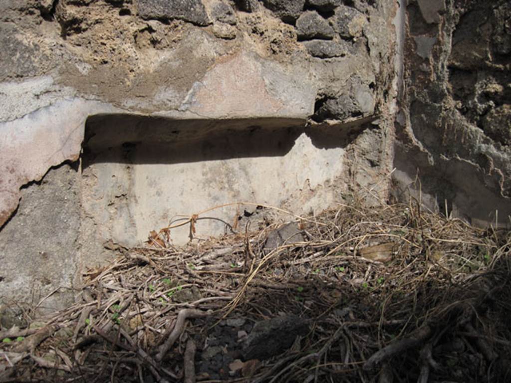 I.3.3 Pompeii. September 2010. Detail of recess in north-east corner of second triclinium.
Photo courtesy of Drew Baker.
