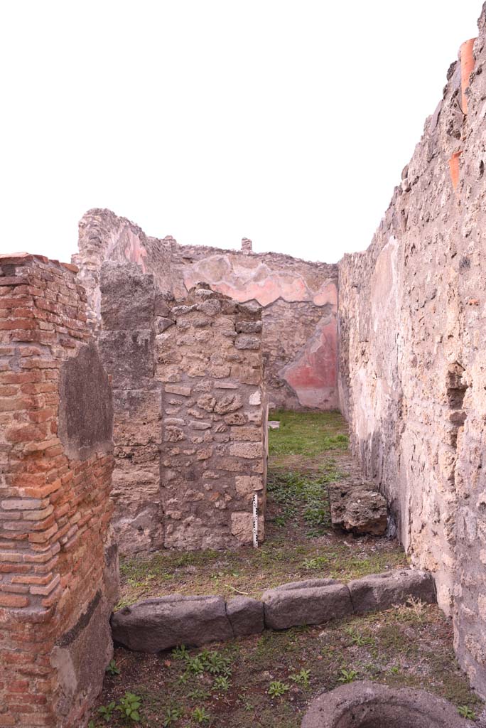 I.4.9 Pompeii. October 2019. 
Corridor i, looking north from east end into room k, leading into triclinium/oecus, room m.
Foto Tobias Busen, ERC Grant 681269 DCOR.
