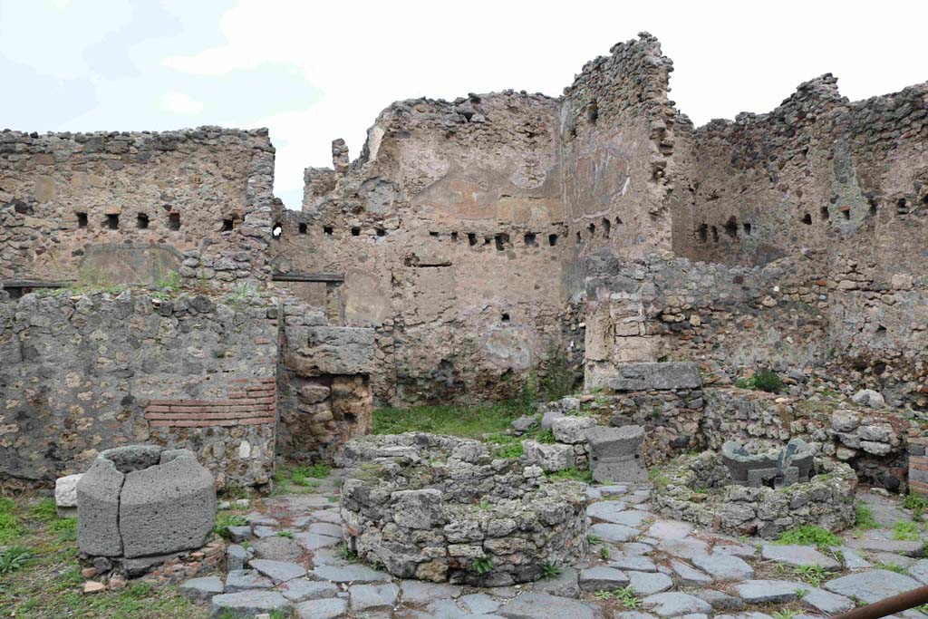 I.4.12 Pompeii. December 2018. Looking north in rear room on east side of bakery. Photo courtesy of Aude Durand.

