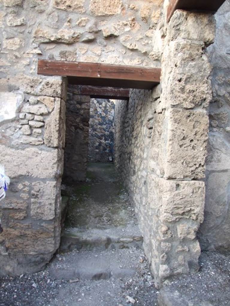 I.4.25/I.4.5 Pompeii. December 2007. 
Doorway to corridor on north side of atrium of I.4.5, leading to kitchen and baths area.

