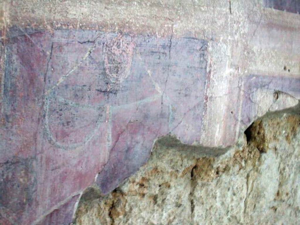 I.6.2 Pompeii. May 2006. Frigidarium, south wall, east end. Detail of painting of suspended vase and garlands.