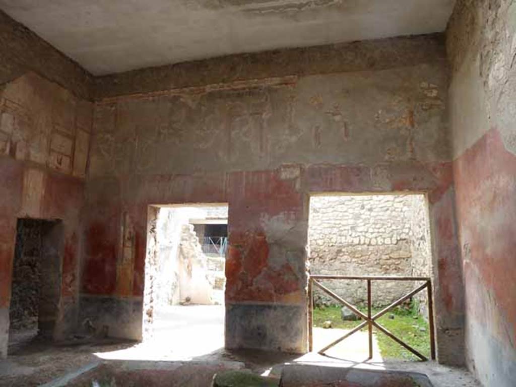 I.6.7 Pompeii. May 2010. Looking south across atrium at doorway to corridor, and entrances to tablinum and neighbouring room.