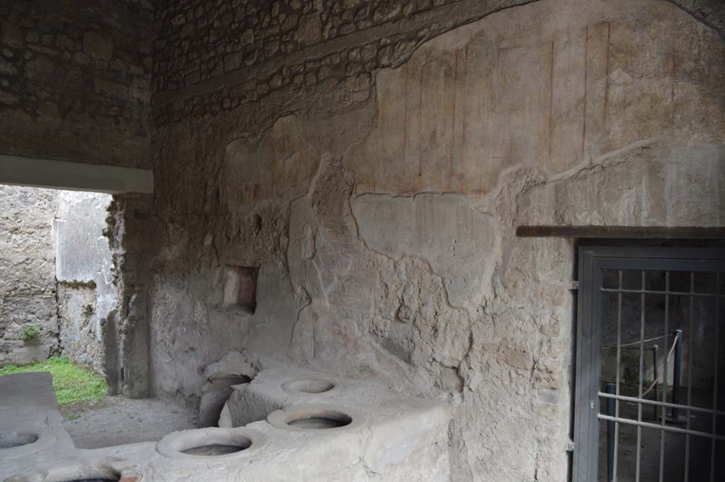 I.8.15 Pompeii. October 2017. Looking north along east wall of shop-room.
Foto Taylor Lauritsen, ERC Grant 681269 DÉCOR.
