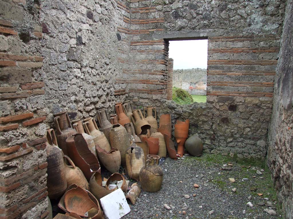 I.9.3 Pompeii. March 2009. Room 5, amphorae.