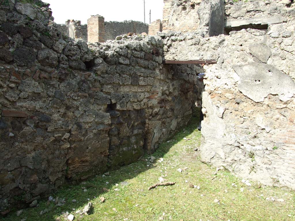 I.9.3 Pompeii. March 2009. Room 9 with doorway to room 7 in north-west corner.