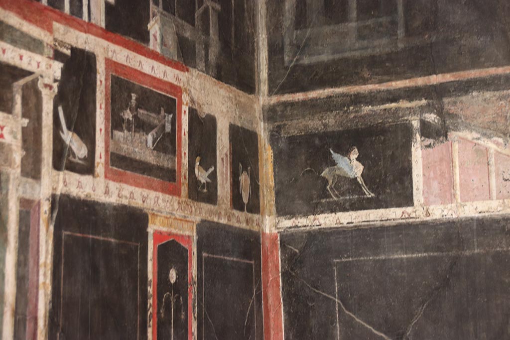 I.9.5 Pompeii. October 2024. Room 10, upper north-west corner of triclinium. Photo courtesy of Klaus Heese