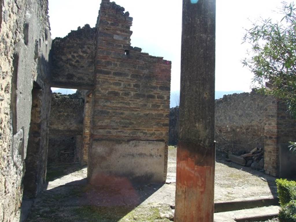 I.9.5 Pompeii. March 2009. Room 12. Looking south across portico area, to doorway to room 15, and Large Triclinium room 17 (on right).