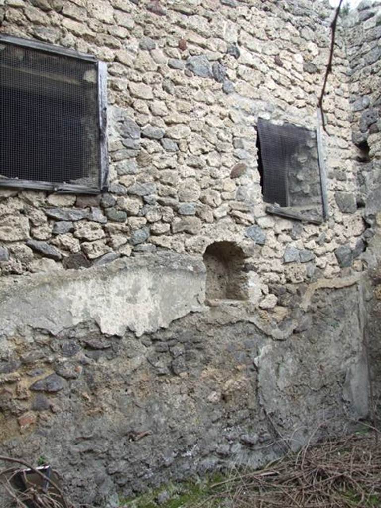 I.9.14 Pompeii. March 2009.  Room 4.  North wall with niche and windows.