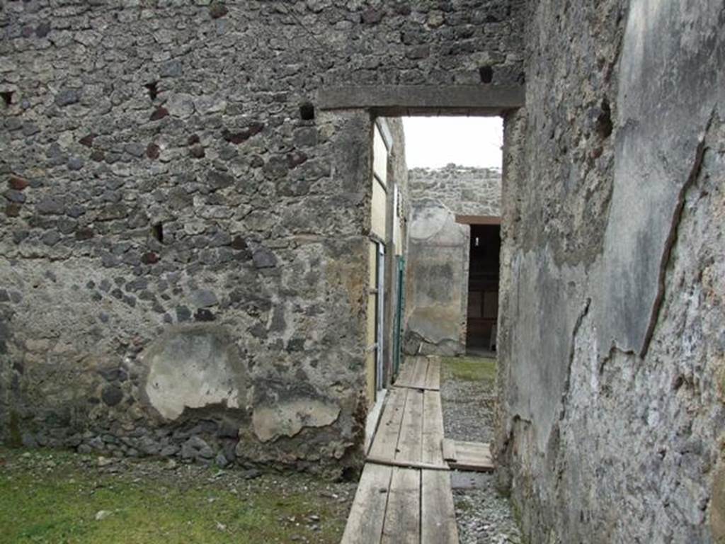 I.9.14 Pompeii. March 2009.  Room 5.  South wall, with continuation of corridor towards atrium.