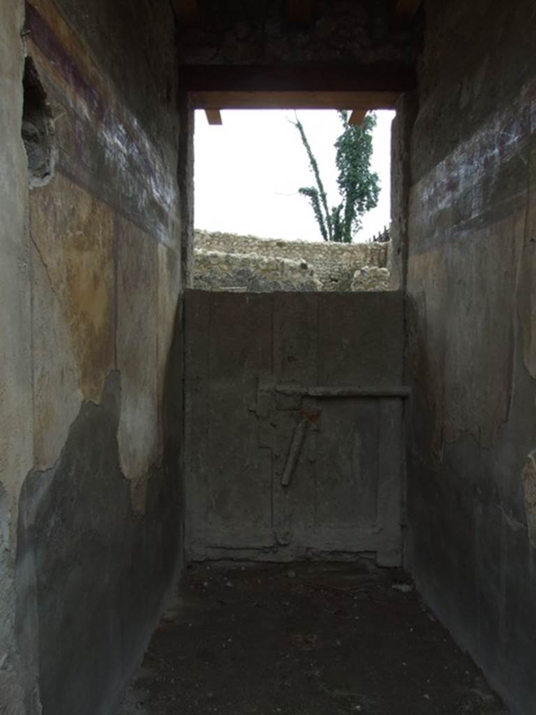 I.9.14 Pompeii. March 2009.  Room 14. Plaster cast of rear of blocked door (of I.9.13). 