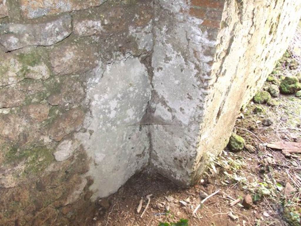 I.10.4 Pompeii. March 2009. Lower floor. Room D. Plaster by door looking out from room containing front of praefurnium.