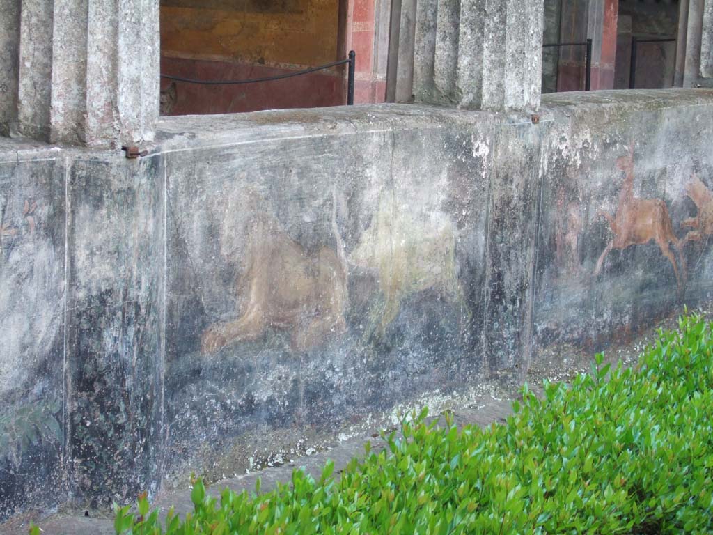 I.10.4 Pompeii. May 2006. Peristyle garden, detail of painted pluteus at south end of peristyle.