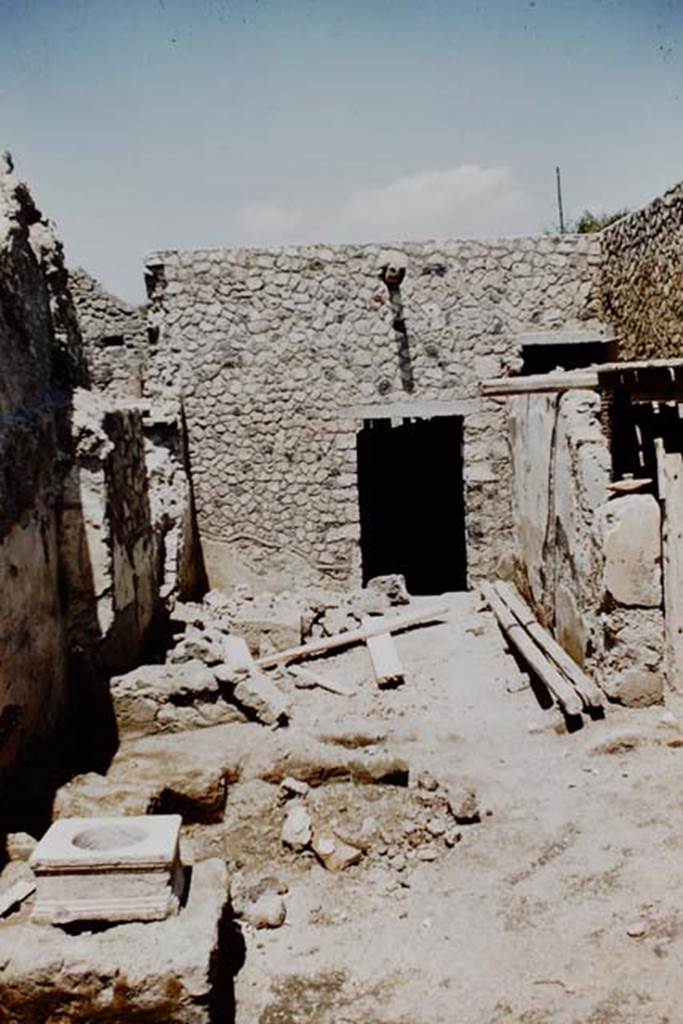 I.12.2 and I.12.1 Pompeii. 1961. Looking north from room 11 into room 17, and its north wall with doorway to room 3. On the right behind the pilaster is a doorway from the corridor.
Photo by Stanley A. Jashemski.
Source: The Wilhelmina and Stanley A. Jashemski archive in the University of Maryland Library, Special Collections (See collection page) and made available under the Creative Commons Attribution-Non Commercial License v.4. See Licence and use details.
J61f0249
