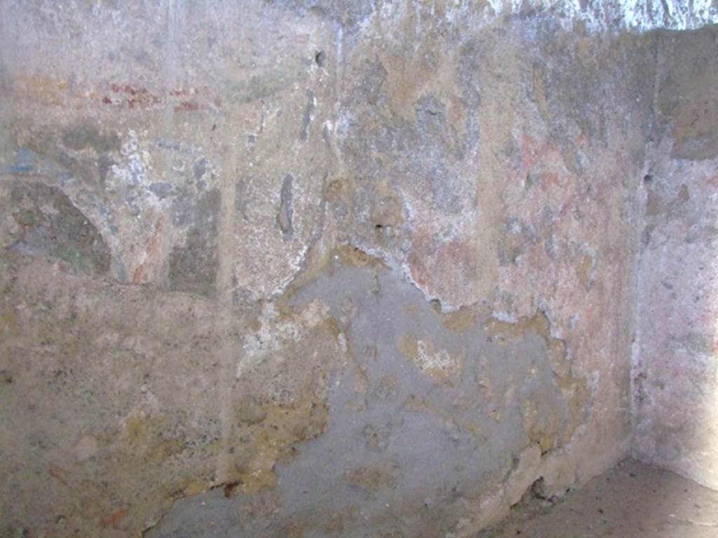 I.12.11 Pompeii. March 2009. Lararium painting with traces of garlands on south wall, looking towards the south-west corner. 