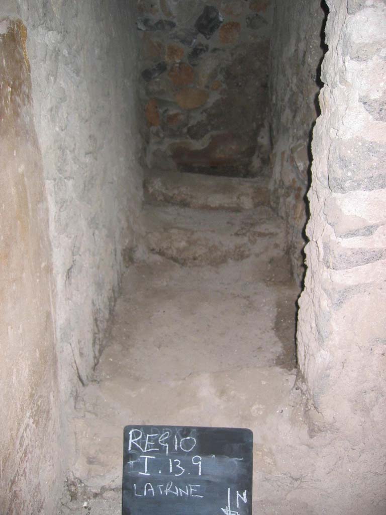 I.13.9 Pompeii. July 2008. 
Looking south into latrine, in south-east corner of atrium. Photo courtesy of Barry Hobson.
