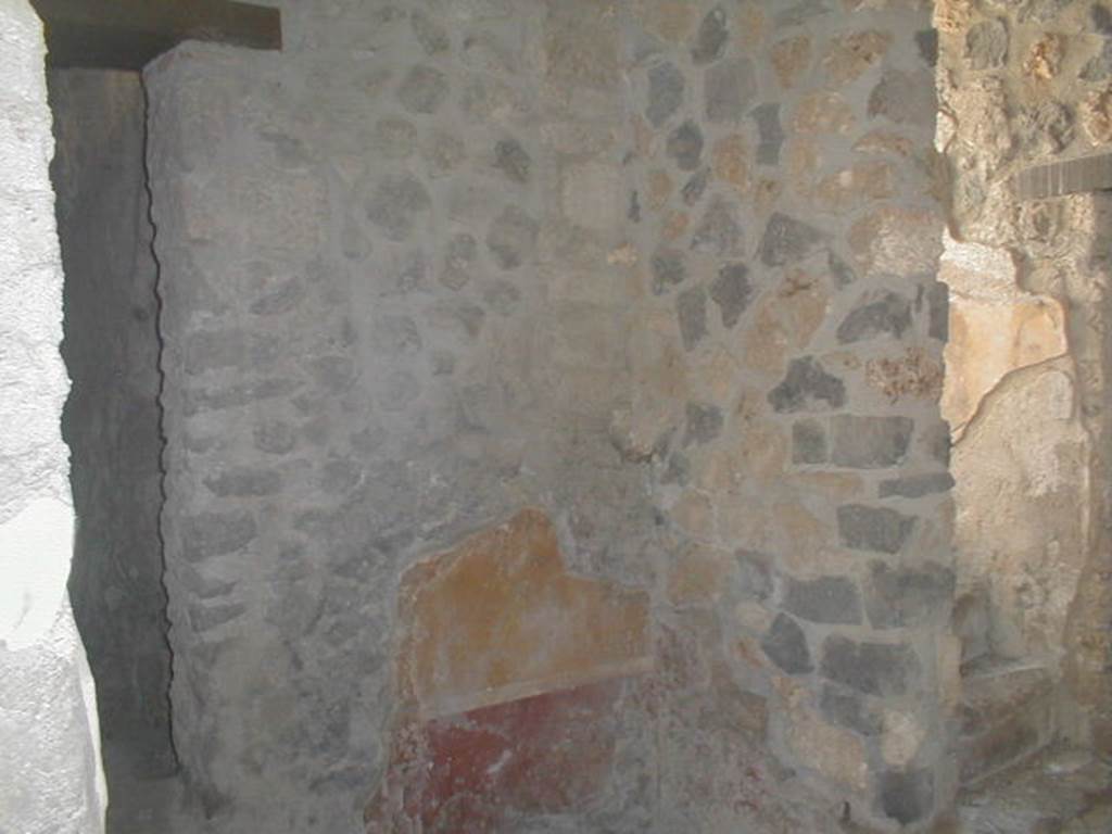 I.13.9 Pompeii. May 2005. South-east corner of atrium with the doorway to the latrine, on the left.