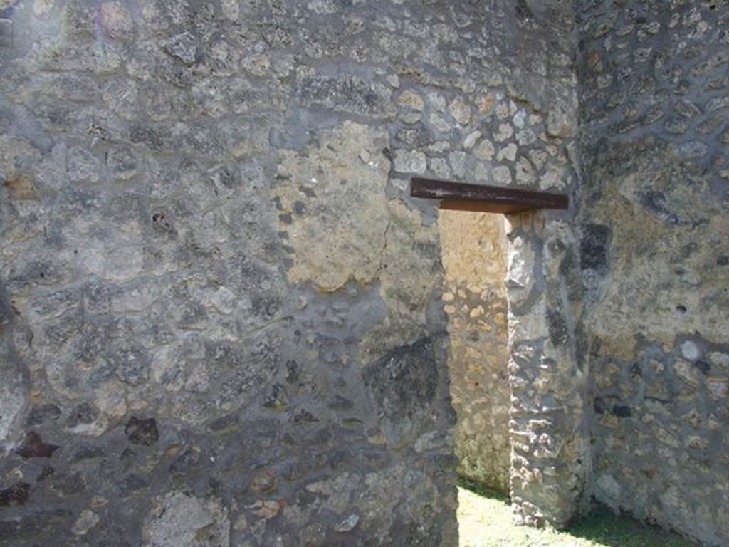 I.14.7 Pompeii.  March 2009.  Door to windowed triclinium in south west corner of atrium.