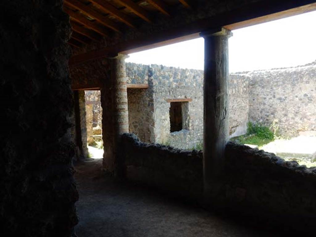 I.14.12, Pompeii. May 2018. Room 32, looking south-west across east portico towards window to room 3, overlooking peristyle. Photo courtesy of Buzz Ferebee
