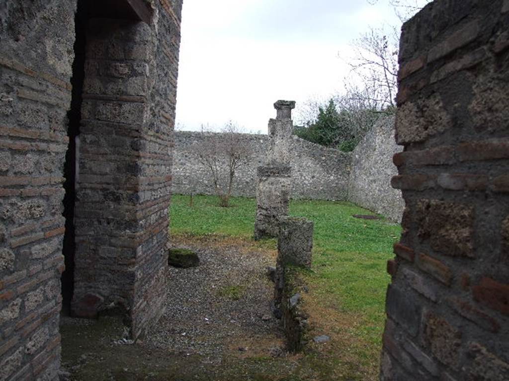 I.16.4 Pompeii. December 2006. Looking south past the doorway to the summer triclinium towards two sided pillared portico and garden.