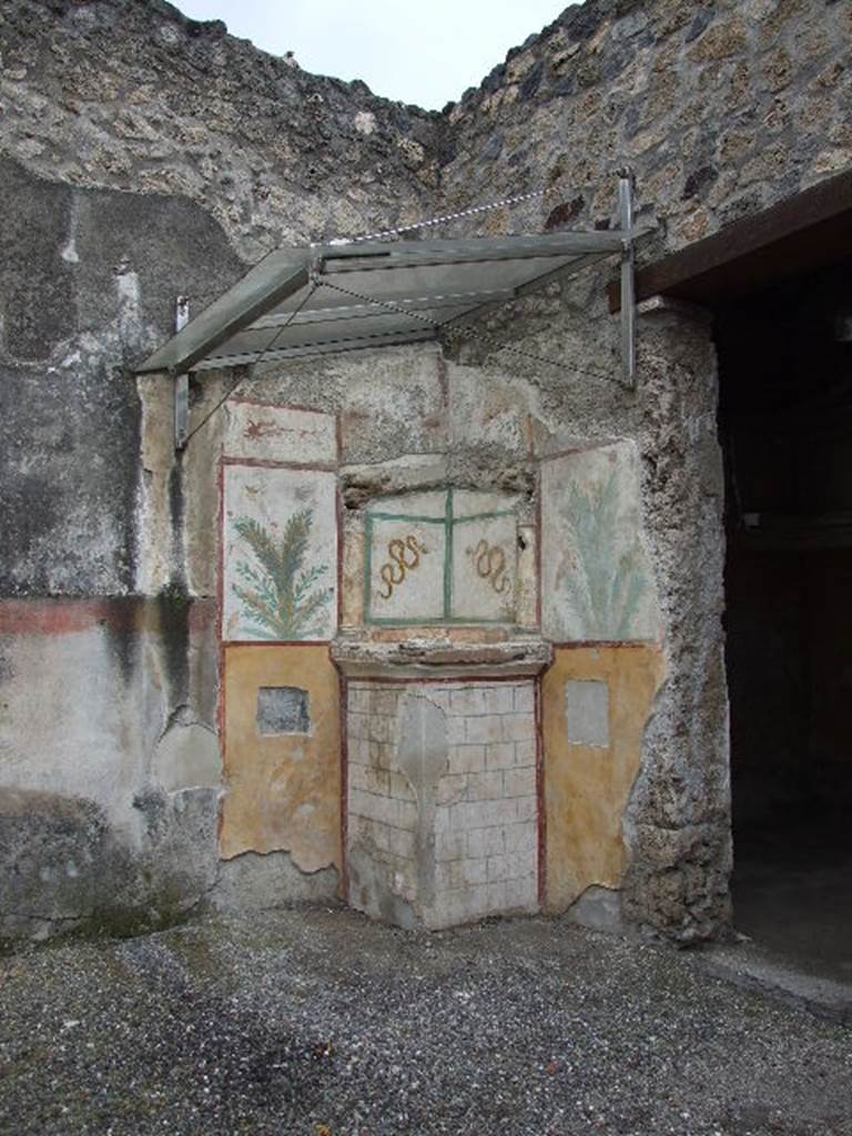 I.16.4 Pompeii. December 2006. Lararium in north-west corner of atrium.