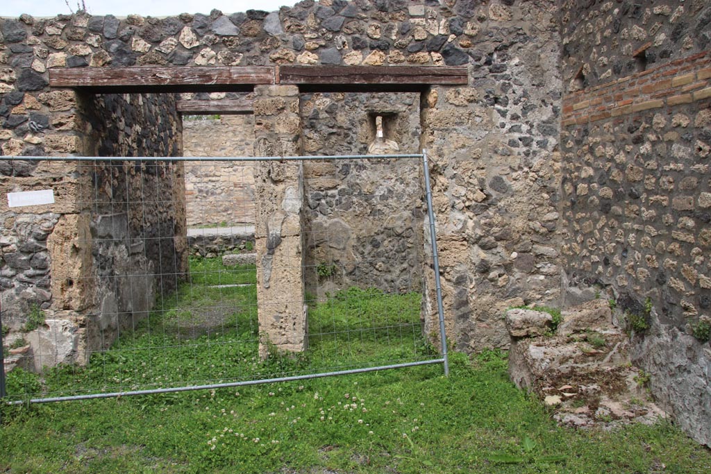 I.21.5 Pompeii. May 2024. Looking north across east side of atrium, towards entrance corridor, on left. Photo courtesy of Klaus Heese.

