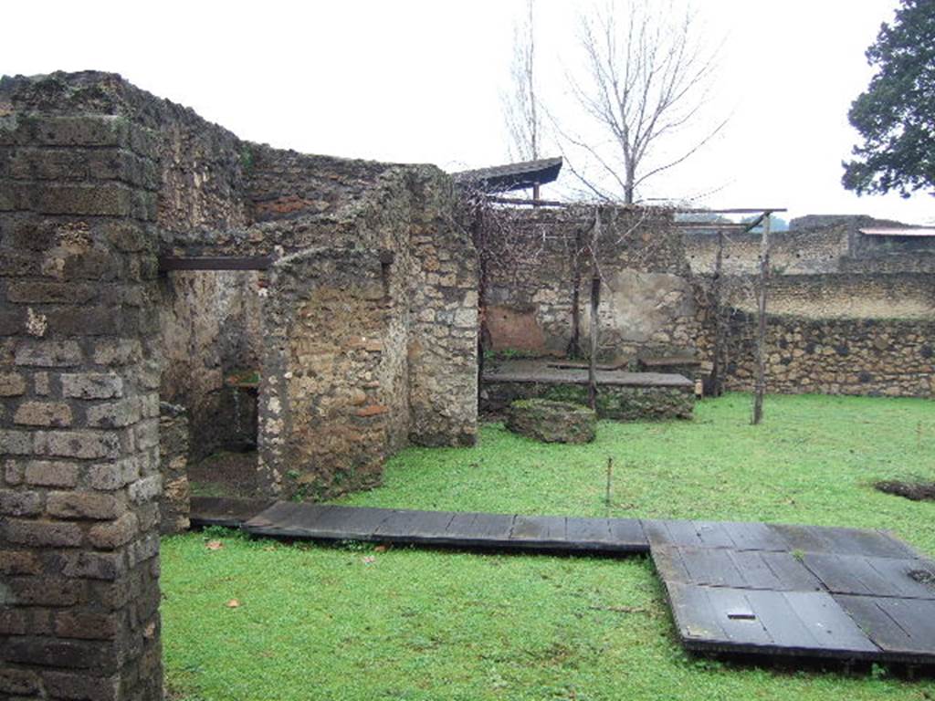 II.1.8 Pompeii. December 2005. Looking north across garden from doorway.