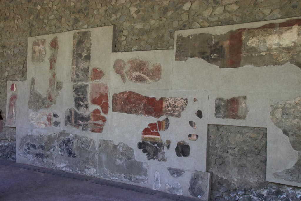 II.7.5 Pompeii. Palaestra. May 2024. Remaining wall decoration from north portico. Photo courtesy of Klaus Heese.