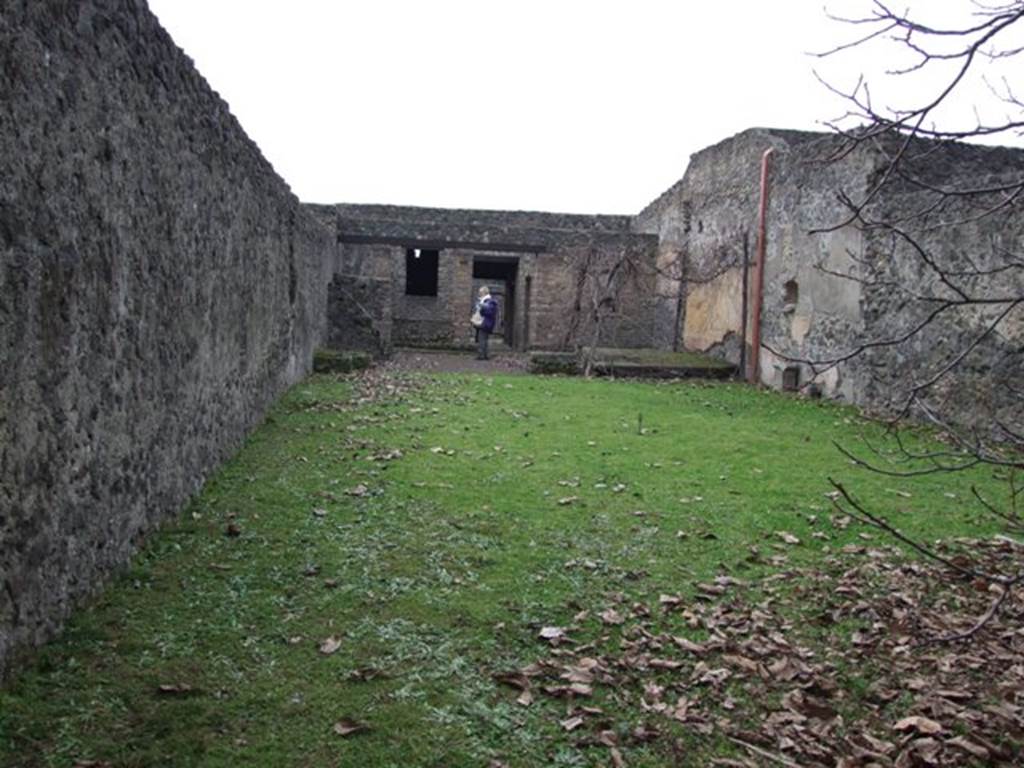 II.8.2.  Thermopolium.  December 2007.  Looking west from rear of garden to front entrance.